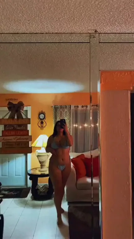 Horny Glasses Babe Teases in Tiny Bikini Mirror Show