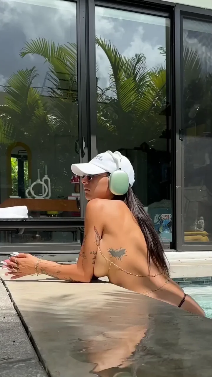 Mia Khalifa's Poolside Tease: Thong-Dropping Dip with Massive Tits