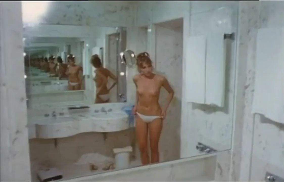 Corinne Brodbeck's Infinity Mirror Boob Tease in The Joy of Flying 1977