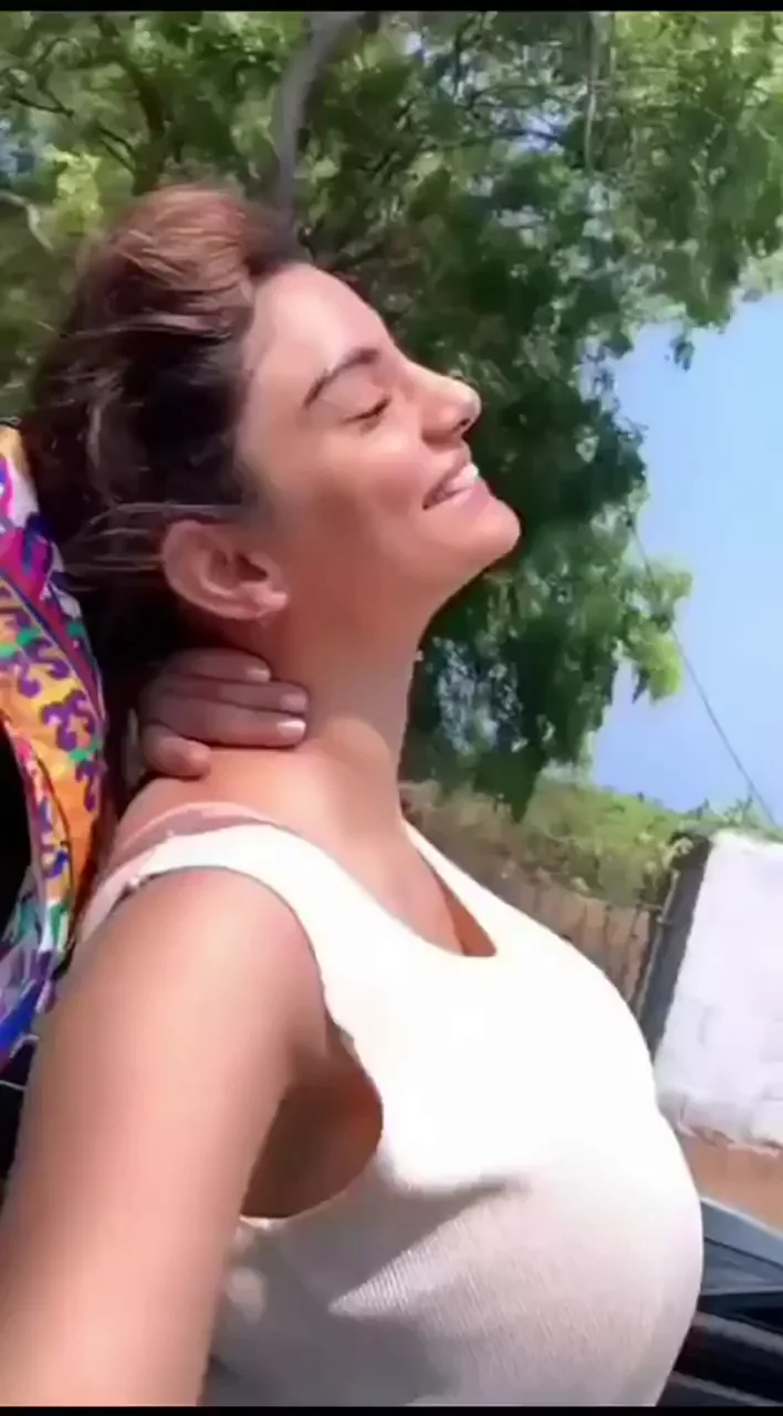 Enjoying the wind in her hair