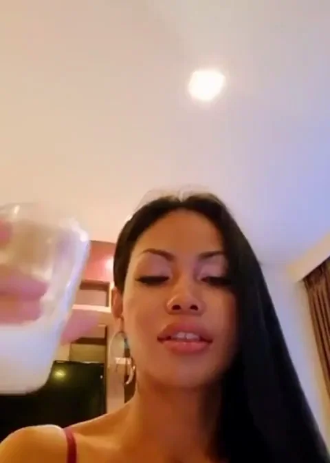 Asian cumslut dumps a cup of cum on her face