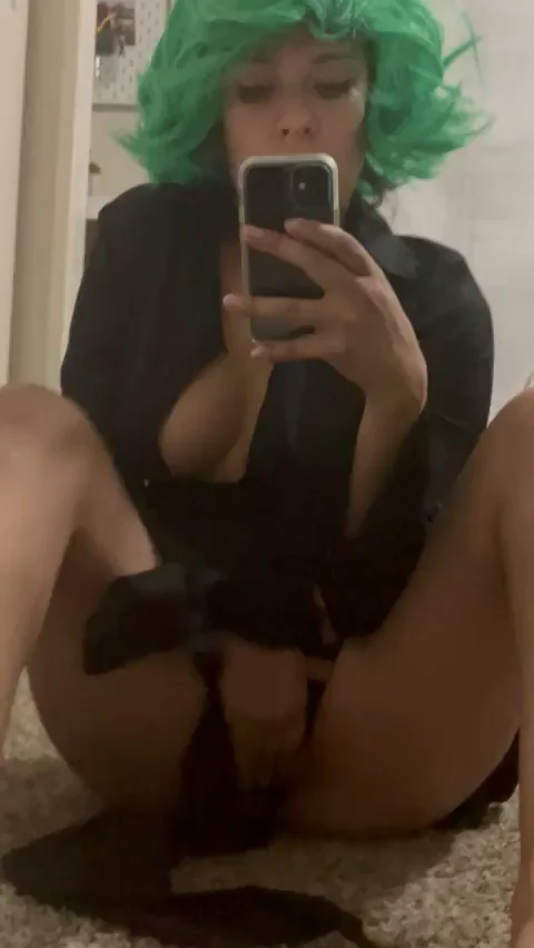 Tatsumaki is [f]eeling herself in front of the mirror