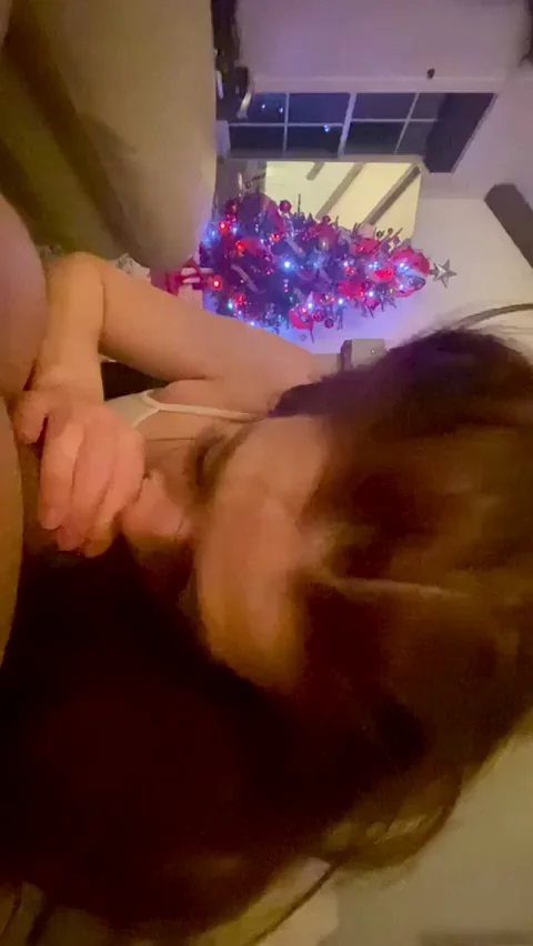 Petite Cheerleader Slut Sucks Massive Cock by the Christmas Tree