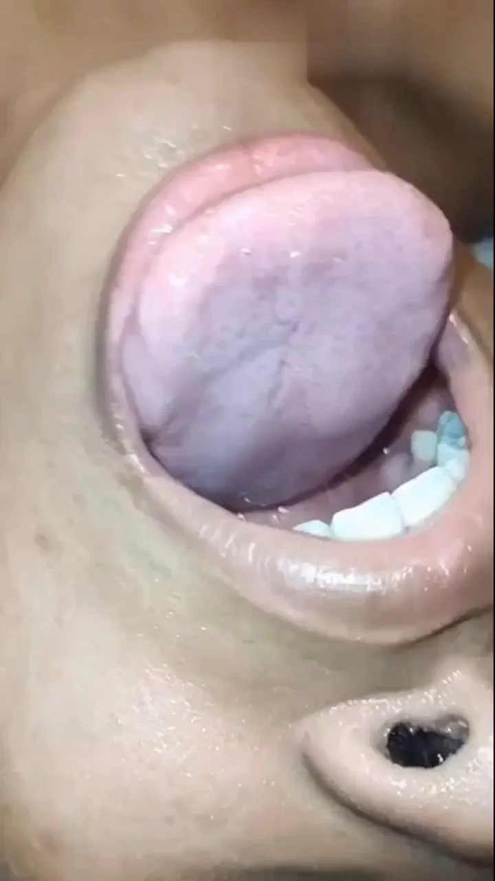 Wanking and slapping cock through her neck