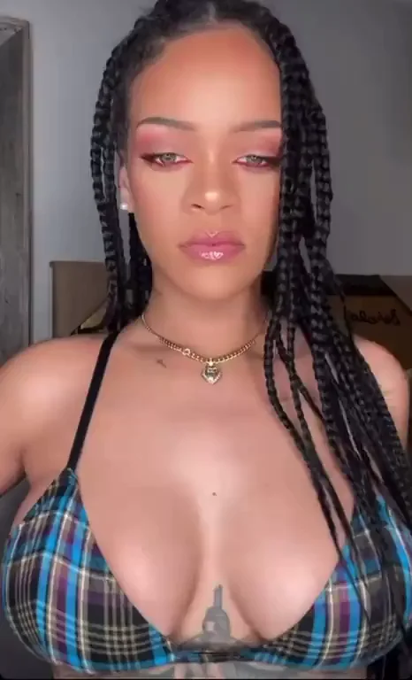 Rihanna's Plaid Top Tease: Ebony Bombshell Boobs Bursting Out