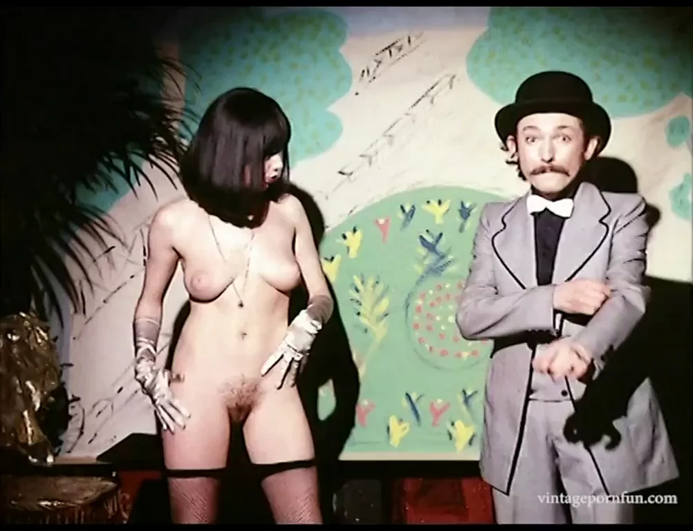 Magician gets out a Bunny from where? ?