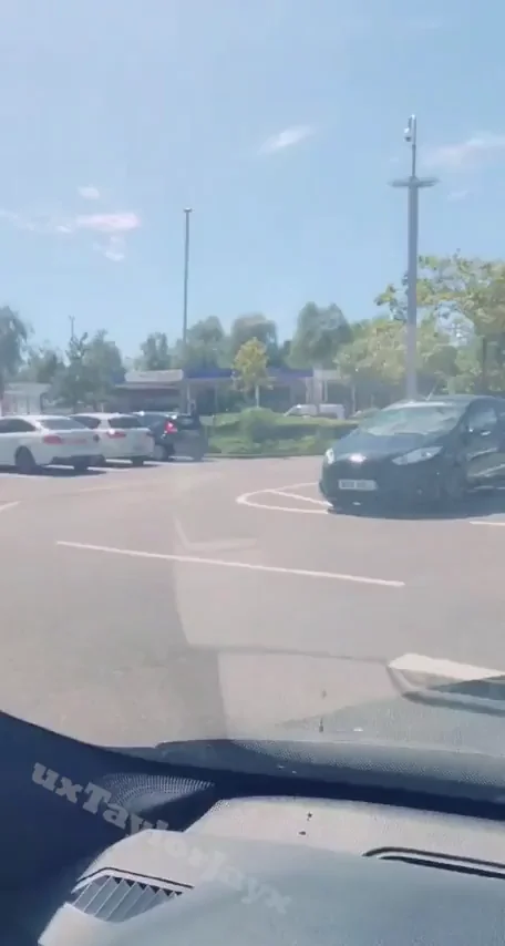 Parking Lot Tease: Busty Slut Fights Moans While Fingering Her Dripping Pussy in Broad Daylight