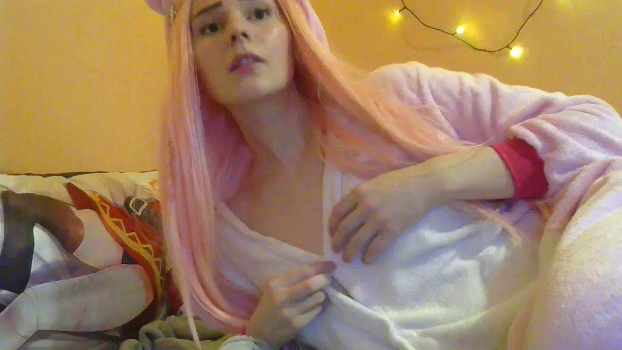 Petite Pink-Haired Pixie Teases Tiny Titty Reveal – 'Not Impressive Enough!'