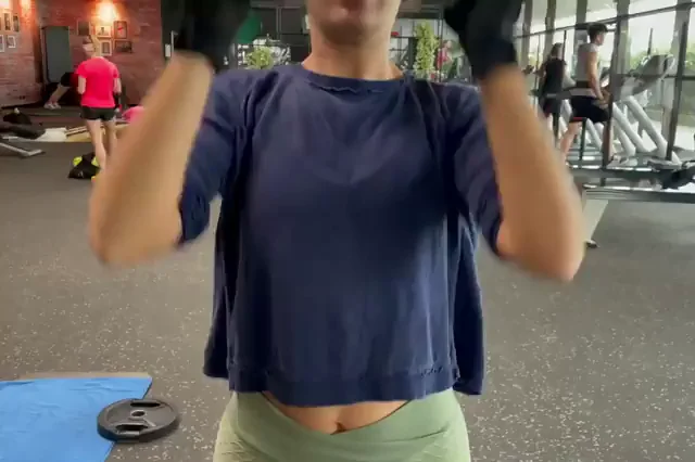 Gym Slut Flashes Her Juicy Tits While Lifting