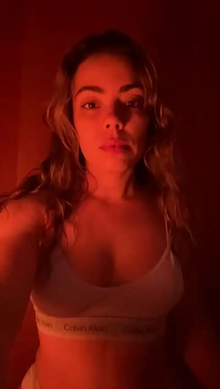 Sultry Slut Begs for Your Hot Cumshot in Red Glow Tease