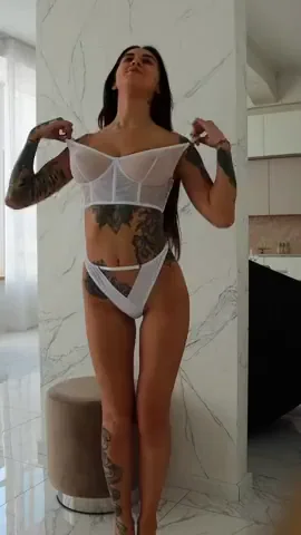 Skinny Inked Slut Flaunts Her Massive Tattled Tits