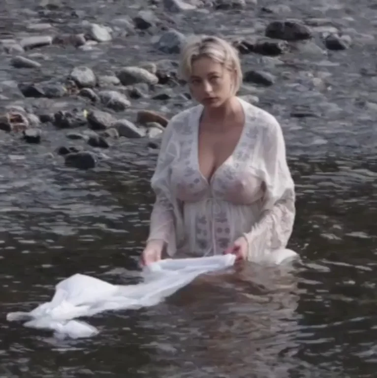 The busty Caroline Vreeland in a wet dress