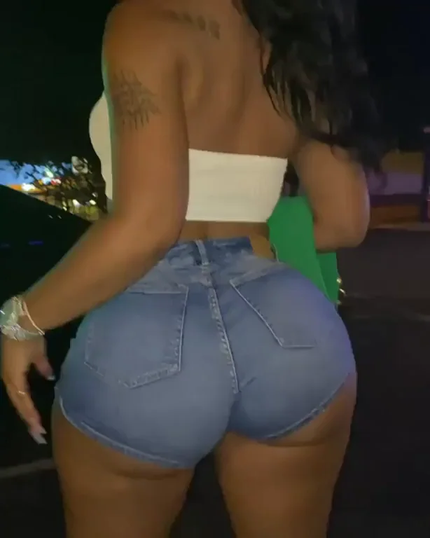 🍑 Thick Ebony Babe Teasing Her Fake Massive Ass in Tight Jean Shorts 🔥